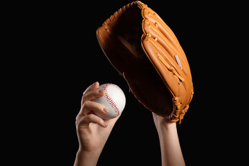 Baseball training and sports competition, player holding a leather glove and ball for practice or professional game preparation on a black background © Pixel-Shot