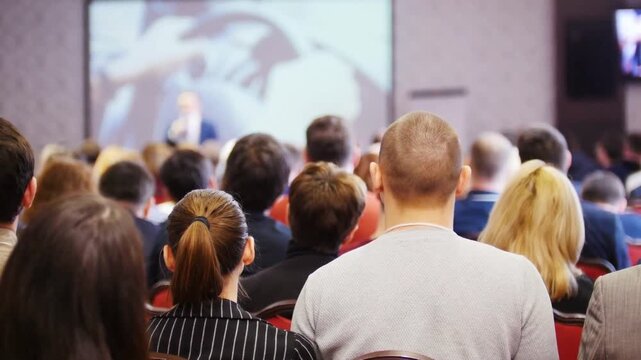Corporate Event Audience Listening To Speaker During Business Presentation