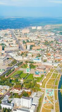 Vertical video. Tula, Russia. Tula Kremlin, Kazanskaya embankment. General panorama of the city from the air. Drone footage, Departure of the camera. Rich colors
