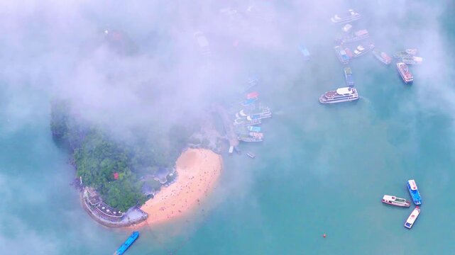 Aerial view of Ha Long Bay, Vietnam with cruise ships, islands among limestone islands. UNESCO World Heritage Site. Popular landmark, famous destination of Vietnam