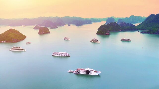 Aerial view of Ha Long Bay, Vietnam with cruise ships, islands among limestone islands. UNESCO World Heritage Site. Popular landmark, famous destination of Vietnam
