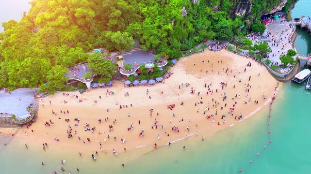 Aerial view of Ha Long Bay, Vietnam with cruise ships, islands among limestone islands. UNESCO World Heritage Site. Popular landmark, famous destination of Vietnam