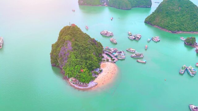Aerial view of Ha Long Bay, Vietnam with cruise ships, islands among limestone islands. UNESCO World Heritage Site. Popular landmark, famous destination of Vietnam