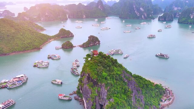 Aerial view of Ha Long Bay, Vietnam with cruise ships, islands among limestone islands. UNESCO World Heritage Site. Popular landmark, famous destination of Vietnam