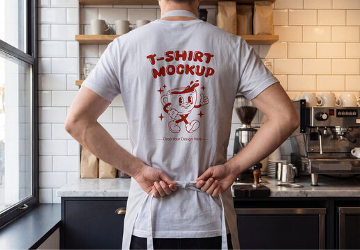 Back View T-Shirt Mockup Man Wearing Apron in Coffee Shop