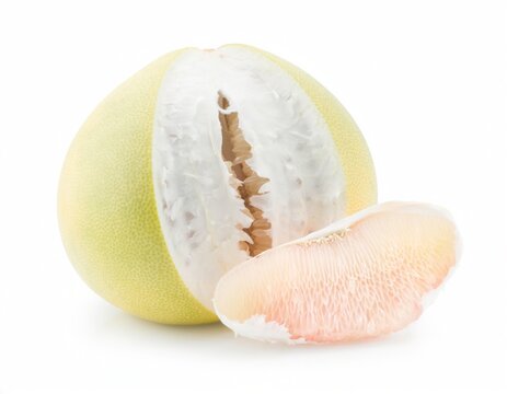 Fresh pomelo fruit with a peeled segment isolated on white background