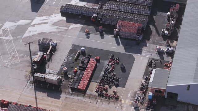 Scoresby, Australia - 13 September 2026: Aerial view of PGH Bricks Pavers Selection Centre with rows of stacked bricks and industrial storage areas.