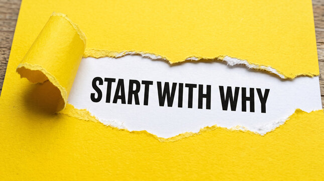 Start with why phrase printed on white paper under torn yellow sheet serves as motivational leadership concept for purpose driven success.
