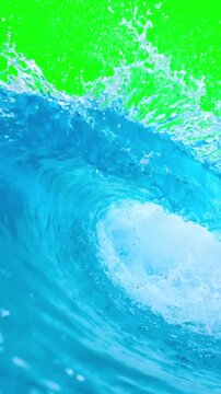 Realistic blue water wave splashing across a bright green screen background for high quality video editing overlay and professional compositing effects