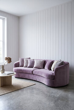 Contemporary living room with curved purple velvet sofa and vertical paneling