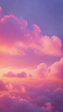 Romantic aesthetic pink clouds drifting slowly across a soft pastel sky at sunset with warm light transitions