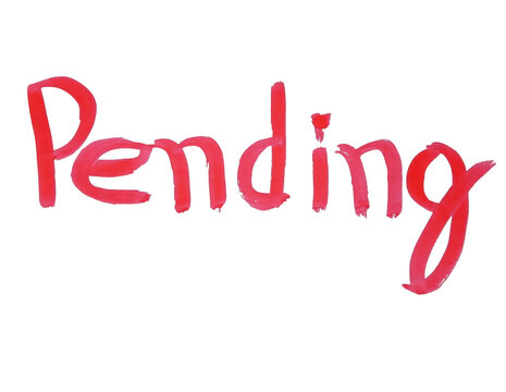 Handwritten pending text in red