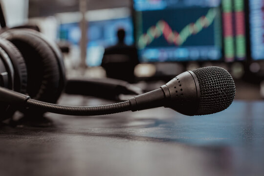 Headset microphone on a desk in a trading room