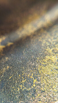 Dark vertical slate texture with parallel golden scratches and lines. Abstract metallic stone background, premium material design layout panel.