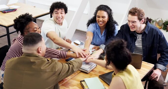 Creative, team or happy people with hands together in office for collaboration, agreement or unity. Excited, group or employees piling with stack or smile for business trust, support or celebration