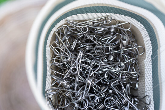 Metal eco friendly clothes pegs in mesh basket