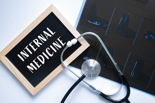 Internal Medicine text on black chalkboard with stethoscope, medical specialty healthcare concept