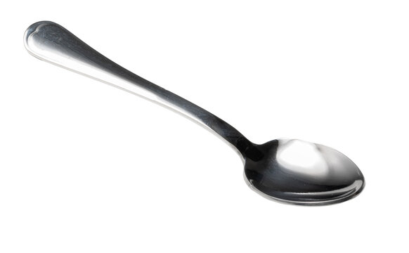 Silver spoon on a white background with a simple design and shiny surface