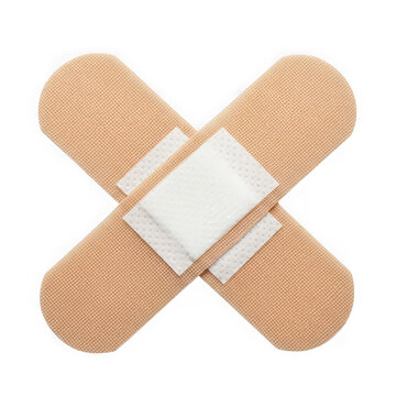 Adhesive fabric bandage cross patch isolated on transparent background for medical concepts