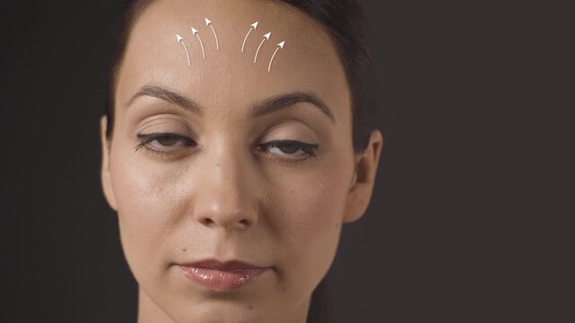 Close-up of a beautiful woman with animated white lines on her face illustrating a facial lifting concept. Ideal for beauty salons, cosmetic services, skincare and aesthetic industry.