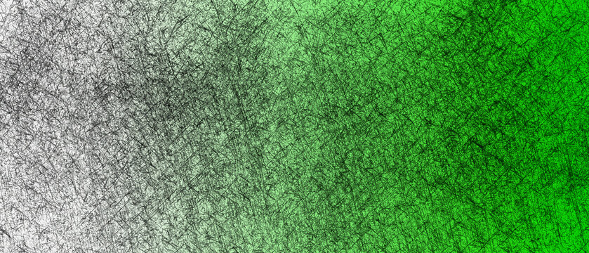 Split image of dry grass and lush green grass side by side