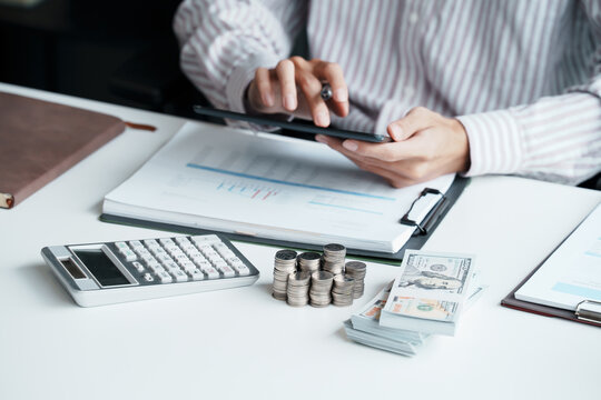 Close Up Business man Hands Using Calculator for Expense Tracking Personal Budgeting Financial Planning and Money Management