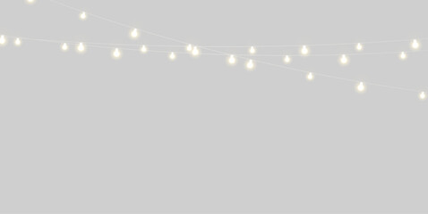 Minimal golden string lights with glowing lamps, modern holiday design element © Jobstock