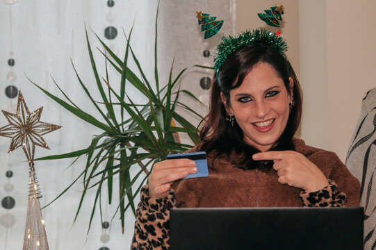 Woman doing online shopping at Christmas