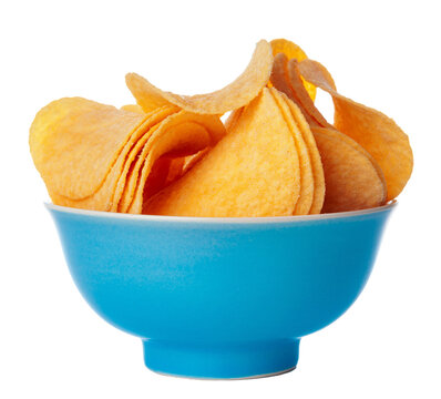 Bowl with potato chips placed on a white background in bright lighting
