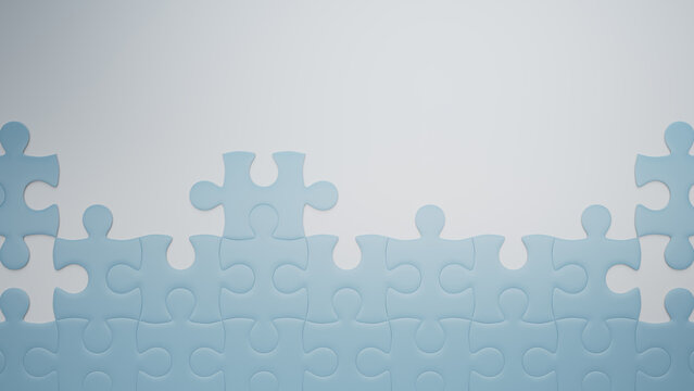 Partially Completed Light Blue and White Jigsaw Puzzle Wallpaper with copy-space. Planning Concept.