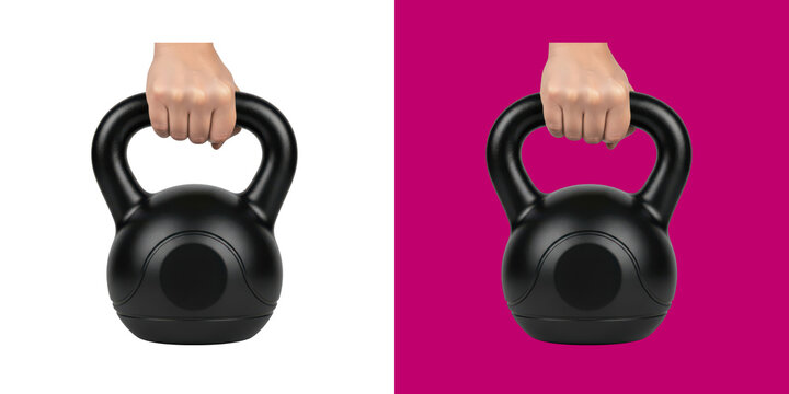 Strong hand holding a black heavy kettlebell for fitness and gym exercise workout