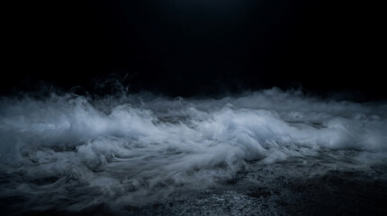 Obraz premium Low lying white fog creeping across a dark textured ground