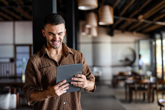 A young restaurant owner leveraging technology to grow his modern and successful dining business
