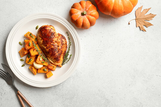 Autumn meal: roasted chicken with pumpkin and herbs