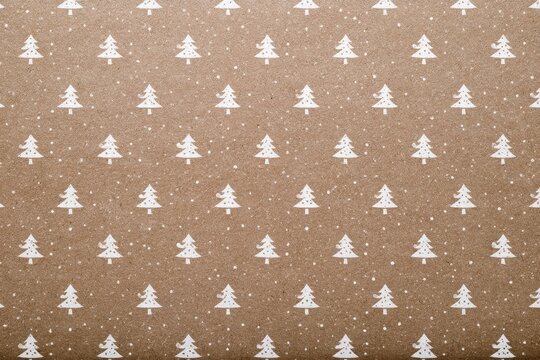 Seamless pattern of stylized white christmas trees on brown kraft paper background