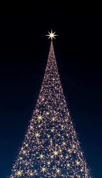 Cosmic Christmas tree formed by twinkling stars against a dark blue sky, Holiday, Shine