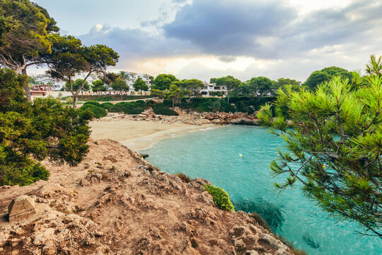 Turquoise cove and beach at Cala Esmeralda, Mallorca, Spain.
