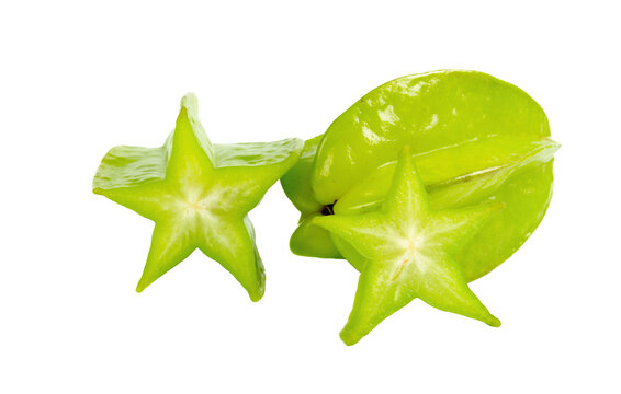 Star fruit sliced and whole on a white background