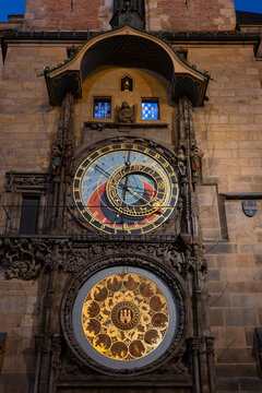 Illuminated medieval astronomical clock in Prague at night