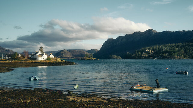 houses and mountains by the water in Plockton