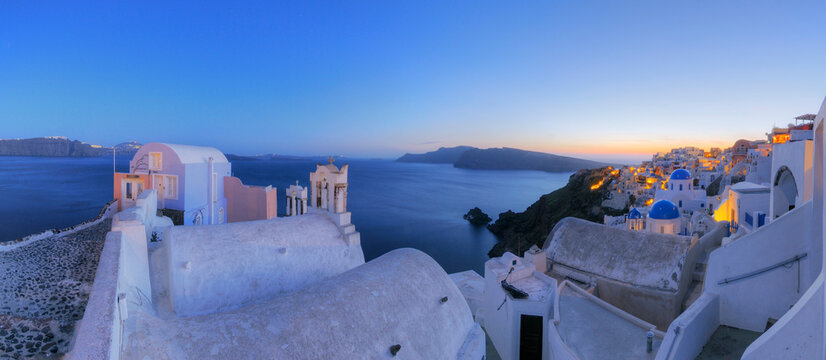 Greece, View of Oia village with bell tower of Greek Orthodox Church at Santorini