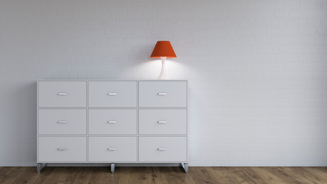 Burning lamp on sideboard