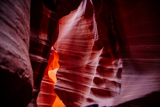 Slot canyon with red and orange sandstone formations in Navajo Land