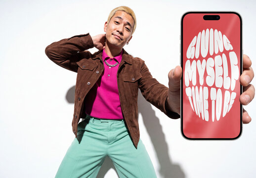Mockup Template of Smartphone Screen Held by Young Man
