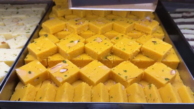 Festival sweets besan barfi indian sweets mithai traditional, south, sweet, north, diwali, festival, celebration, kaju, katli, mysore, pak, deepavali, festive, season, rakhi, holi, wedding 4k footage