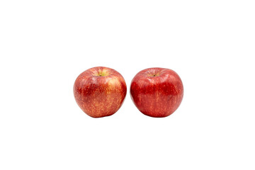 Two fresh red apples with water droplets stand side by side against a plain on a transparent Background, showing natural fruit texture and color. © Mukta