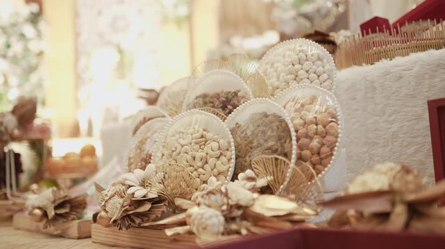 Beautifully decorated dry fruits hampers and gift packings on display at traditional Indian wedding reception