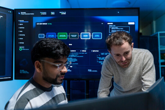 Software engineering use computer working development office are assisting algorithm systems or verifying code. Programmer teamwork using artificial intelligence on laptop analysis or writing coding