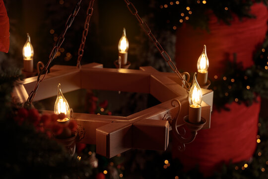chandelier lamp light in dark hall close up interior object view Christmas entourage atmosphere