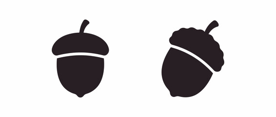Black acorn icons with caps isolated on transparent background. Oak seed symbols for designs. Acorn, acorn cap. Minimalist vector illustration. © andhikanov